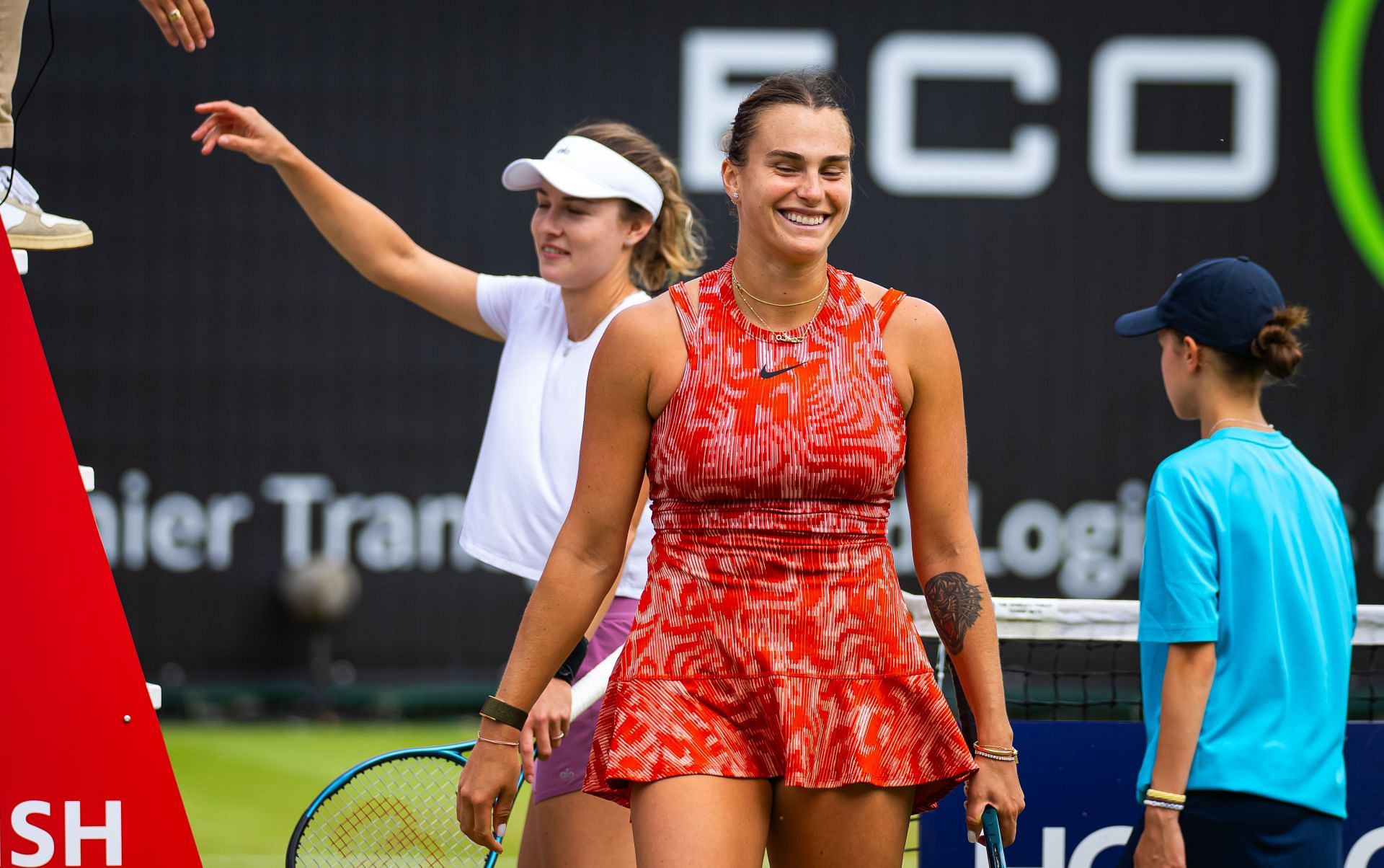 Aryna Sabalenka (in red) retires during her quarterfinal match at the 2024 Berlin Ladies Open (Source: Getty)